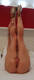 A gambe strette